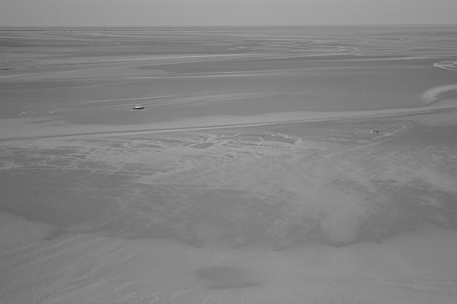 People boat tidal flat